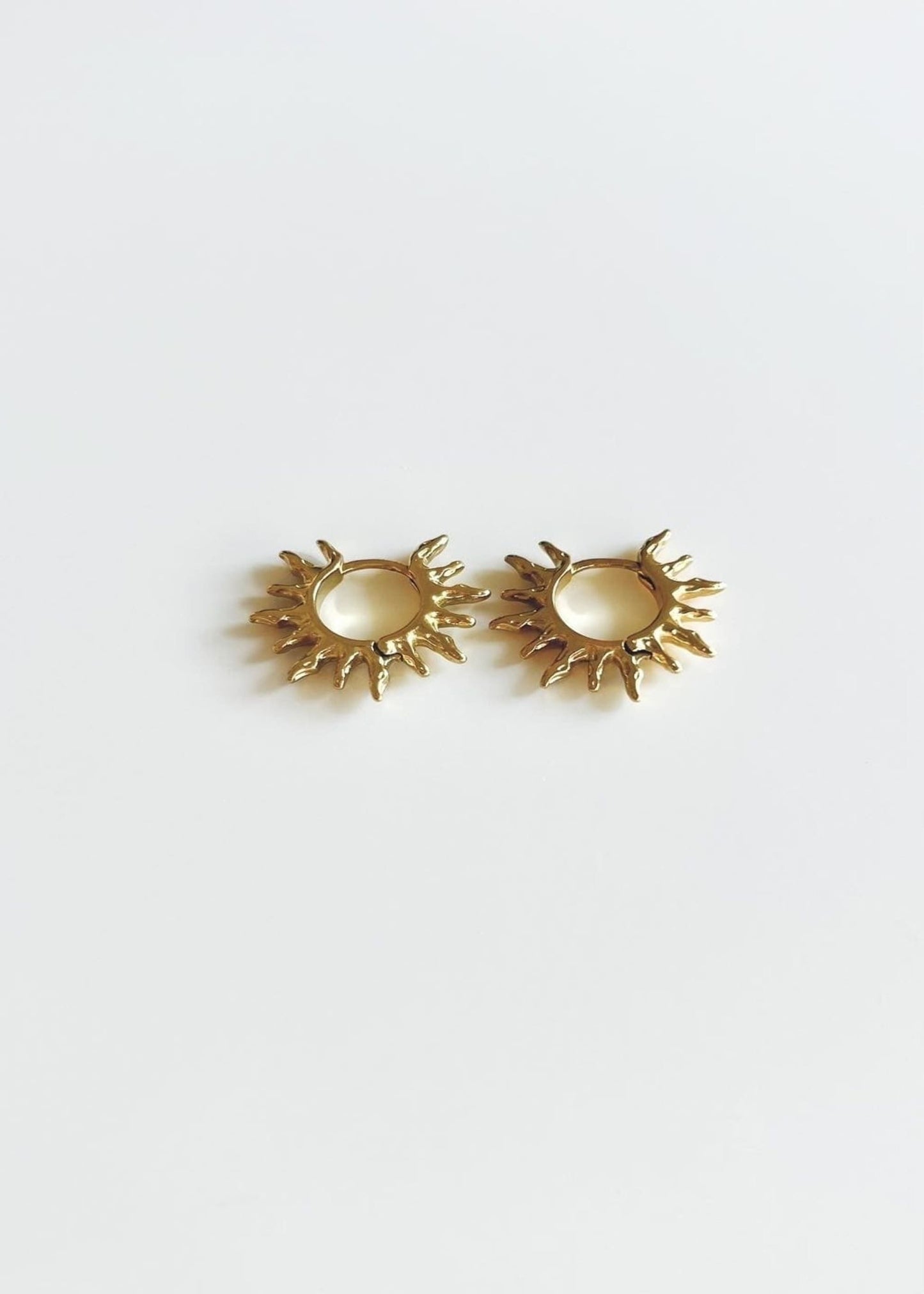 Pendientes sol